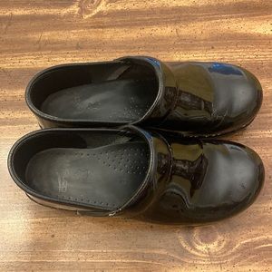 Dansko black patent clogs